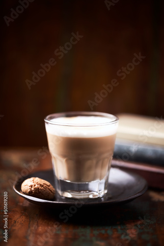 Coffee with milk on dark wooden background. Soft focus. Copy space.