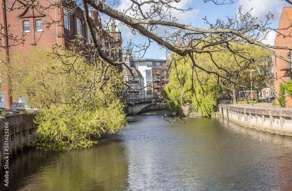 Norwich, Norfolk, UK – April 26 2022. View along the River Wensum on a bright and sunny morning Norwich, Norfolk, UK – April 26 2022. View along the River Wensum on a bright and sunny morning