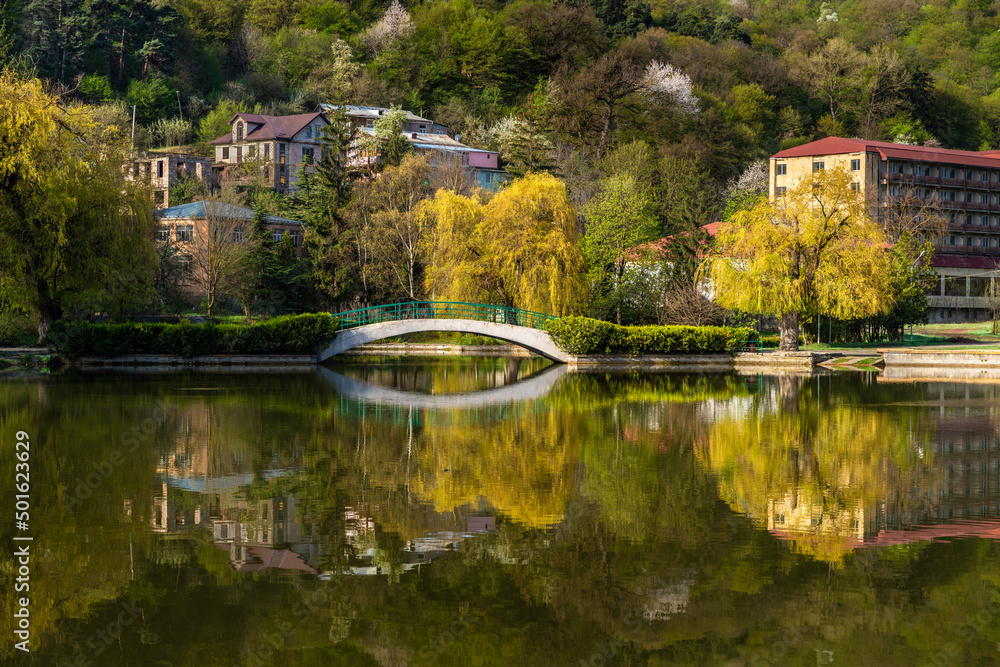 Small bridge cross over the small lake in Dilijan city park