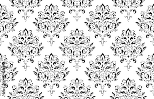 Wallpaper in the style of Baroque. Seamless vector background. White and gray floral ornament. Graphic pattern for fabric, wallpaper, packaging. Ornate Damask flower ornament.