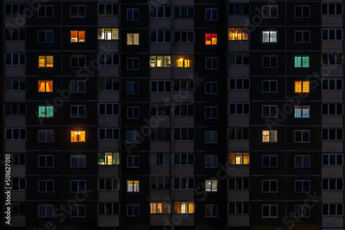 Fotografie flat night panorama of multicolor heart light in windows of multistory buildings
