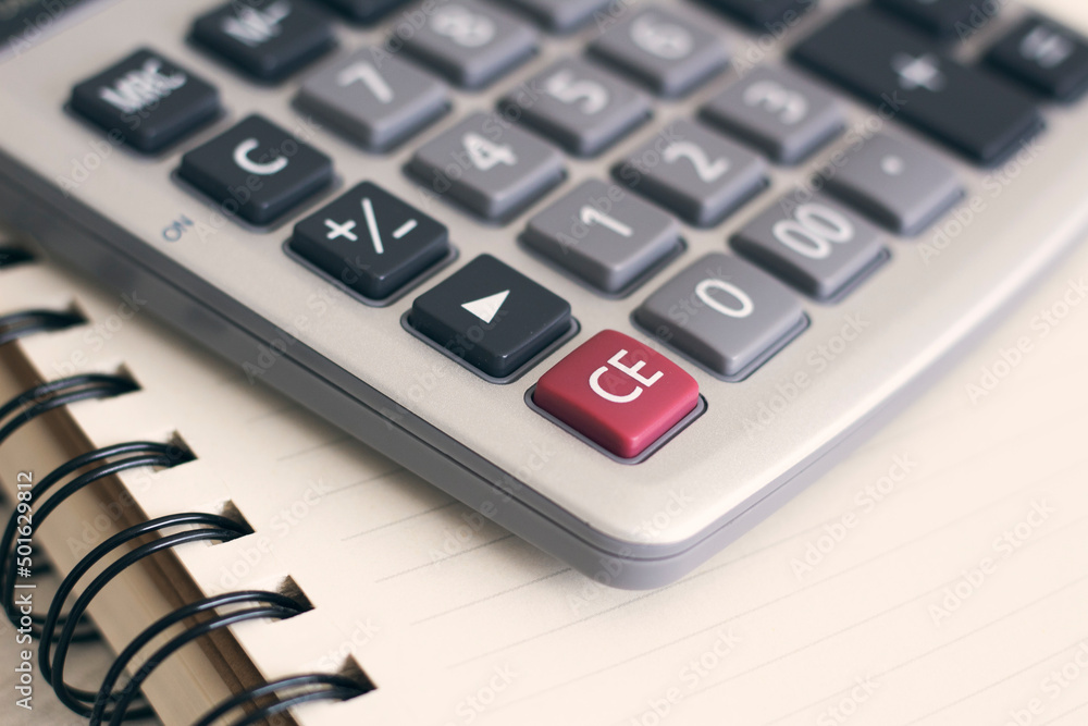 Calculator with notebook desk. Close up calculator Calculator with notebook desk. Close up calculator