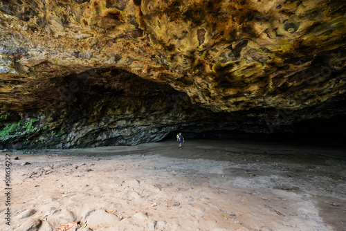 Maniniholo Dry Cave along the Kuhio Highway next to Haena Beach Park on the north shore of Kauai island in Hawaii, United States photo