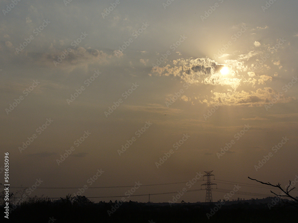 sunrise in the cloud and power tower sunrise in the cloud and power tower