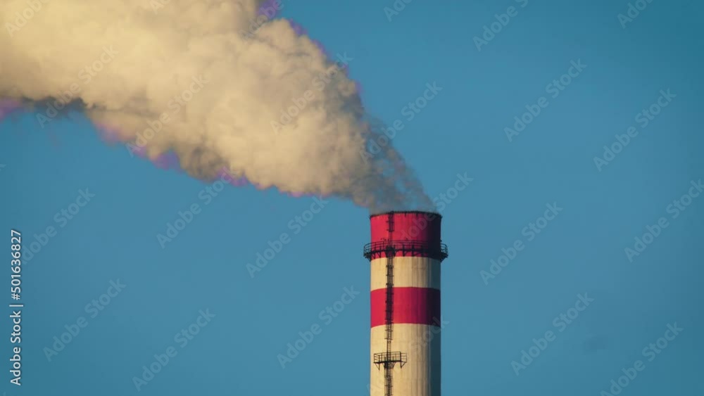 Pipe with outgoing steam on a blue sky background. Environmental damage, emissions, air pollution. Animation effect. Vignetting Pipe with outgoing steam on a blue sky background. Environmental damage, emissions, air pollution. Animation effect. Vignetting