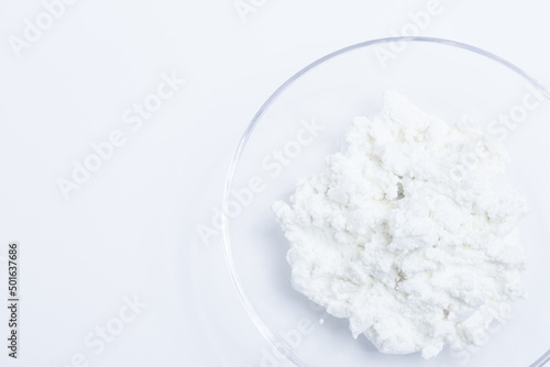 cottage cheese in a glass transparent bowl isolated on a white background