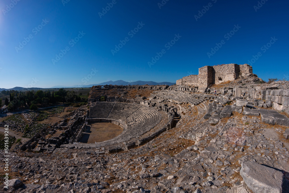 Miletus theater. The ancient roman amphitheater at Miletus, Turkey. Panoramic view photographed with the aid of a fish eye lens.