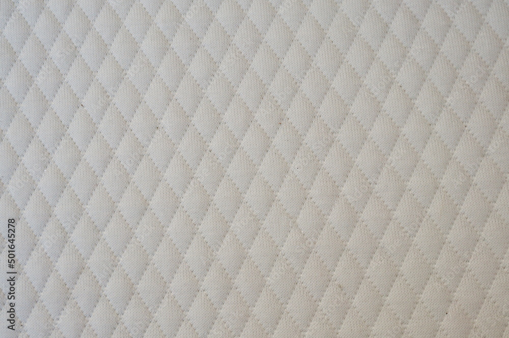 Sewn Diamond Design on White Fabric Sewn Diamond Design on White Fabric