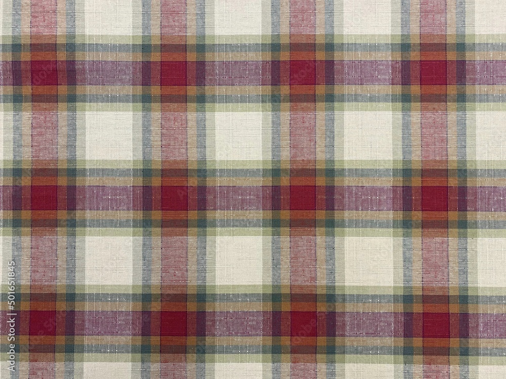 Colored checkered table cloth background. Texture of textile table napkin. Multicoloured gingham background. Colored checkered table cloth background. Texture of textile table napkin. Multicoloured gingham background.
