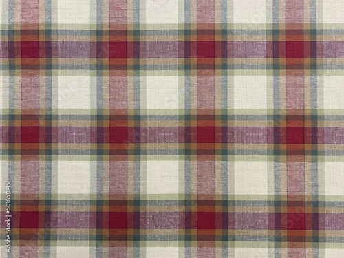 Colored checkered table cloth background. Texture of textile table napkin. Multicoloured gingham background.