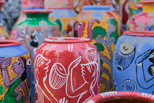 Bright colorful terracotta pots, works of handicraft, on display during Handicraft Fair in Kolkata - the biggest handicrafts fair in Asia. © mitrarudra