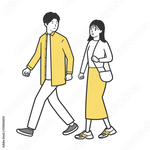 喋りながら歩く若い男女