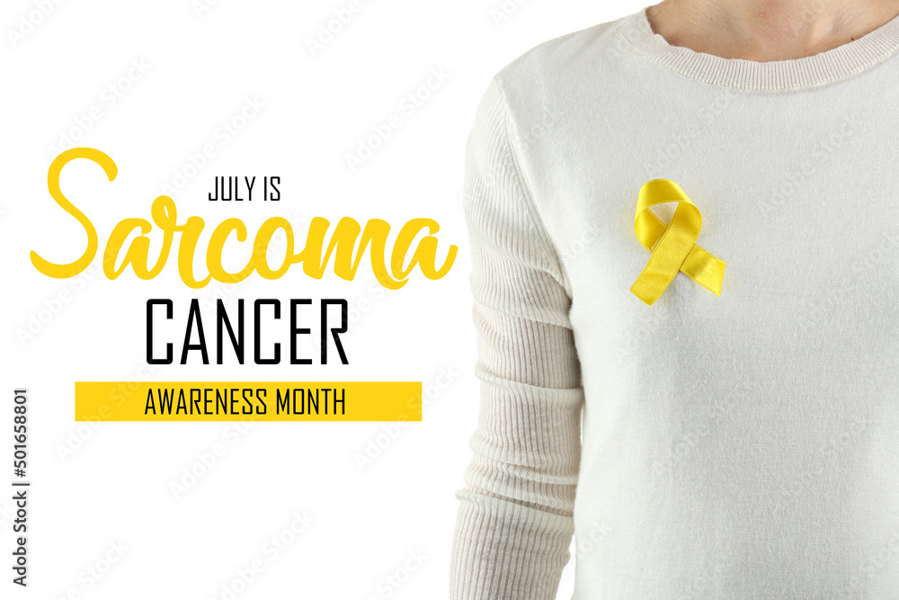 Woman with yellow ribbon and text JULY IS SARCOMA CANCER AWARENESS MONTH on white background