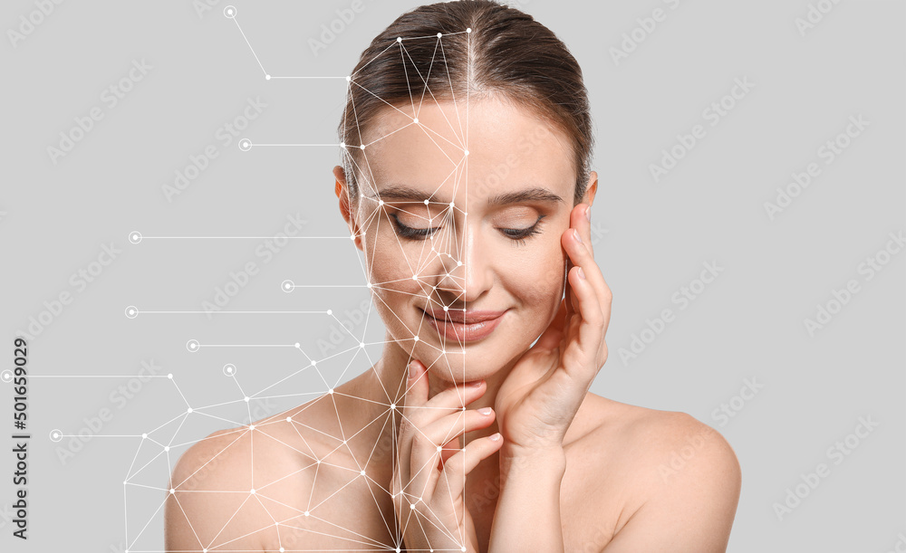 Fototapeta premium Beautiful young woman on light background. Skin care concept