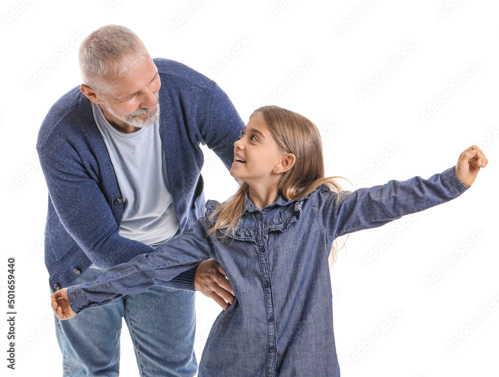 Senior man with his little granddaughter on white background Senior man with his little granddaughter on white background