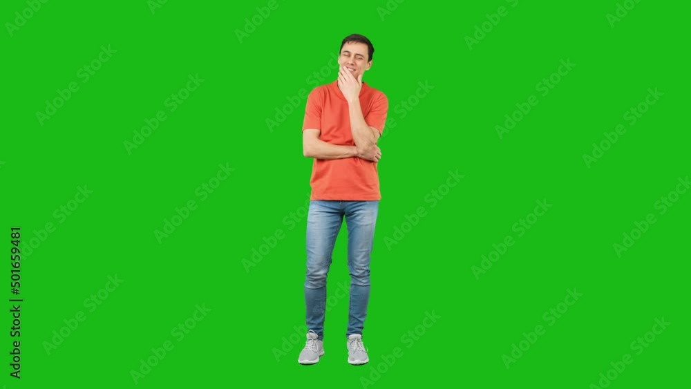 Positive man in casual outfit touching chin and thinking Positive man in casual outfit touching chin and thinking