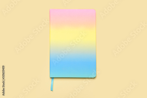 Fototapeta Naklejka Na Ścianę i Meble -  Bright notebook on color background