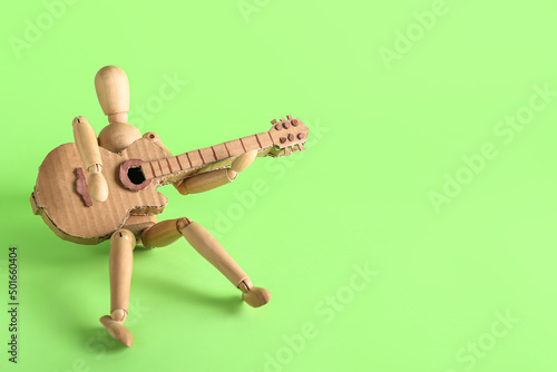 Wooden mannequin with cardb...