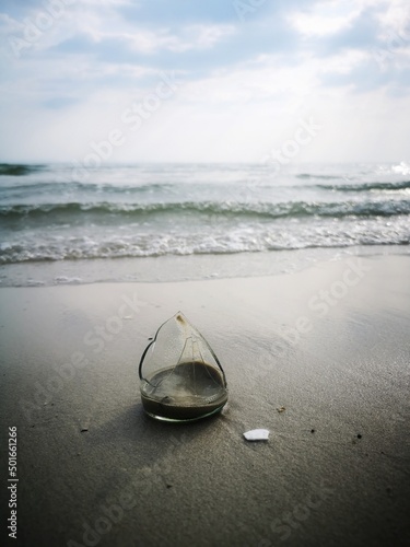 broken glass on beach may be danger to people