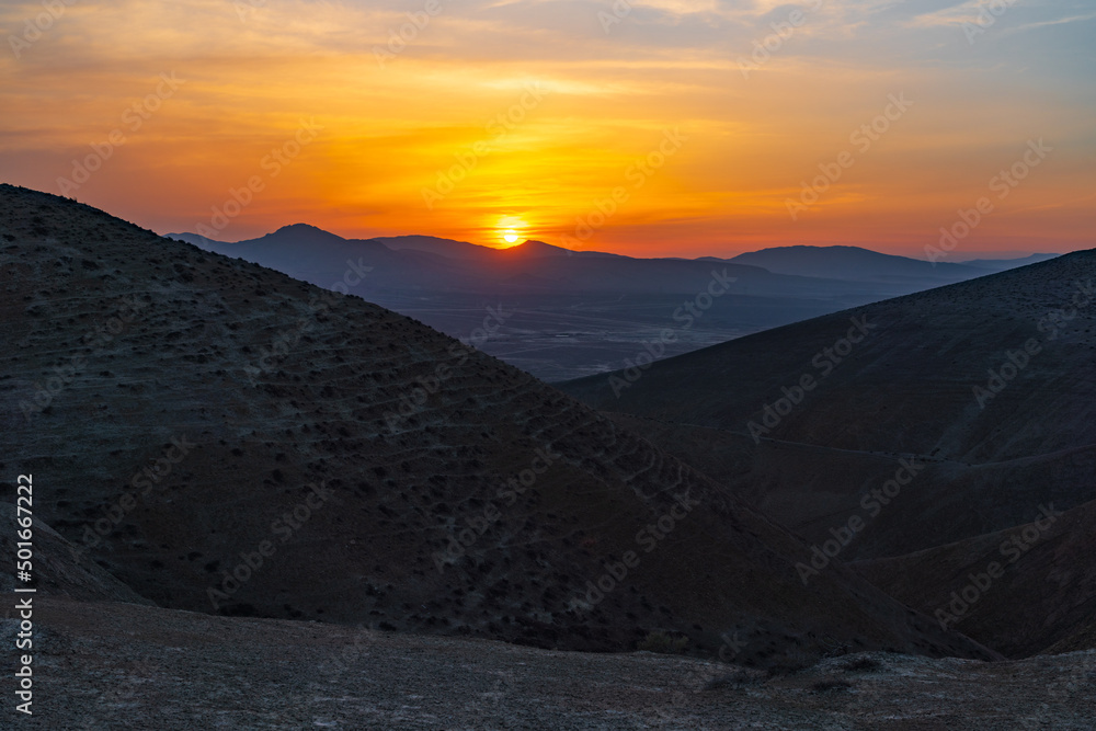 View of the mountain range at sunset