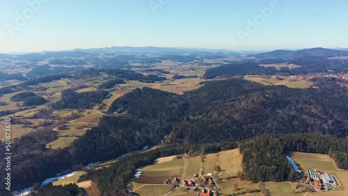 Filmmaterial des Bayerischen Wald bei Grafenau und Grossarmschlag mit Blick in Richtung Bömen zu den Bergen Rachel Lusen und Arber im Frühling, Deutschland photo
