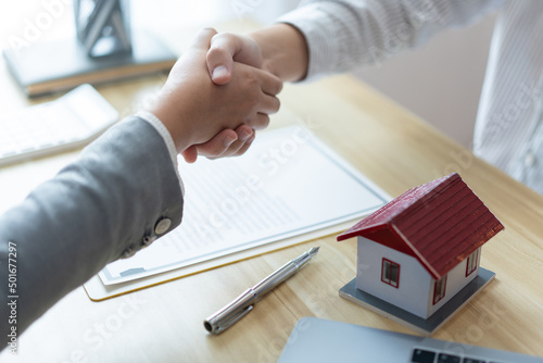 Insurance concept the chattel agent making a perfect deal of estate with his customer