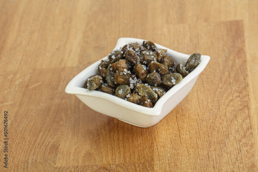 Salted marinated capers snack appetiser Salted marinated capers snack appetiser