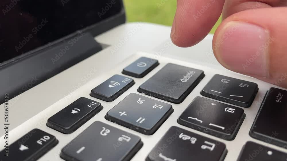 Typing on keyboard. Male hand finger press 