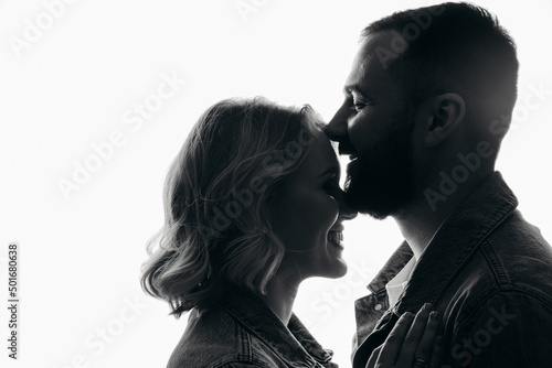 silhouette of a couple, portrait of a couple. close portrait of a couple in love. portrait man woman on white background.
