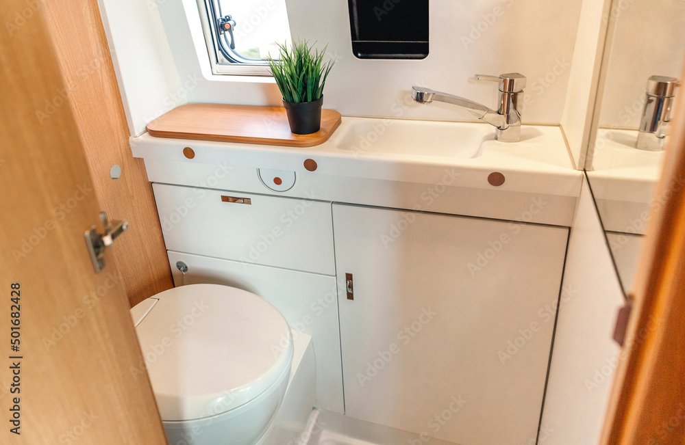 Camper van bathroom interior with toilet and sink Stock Photo Adobe Stock