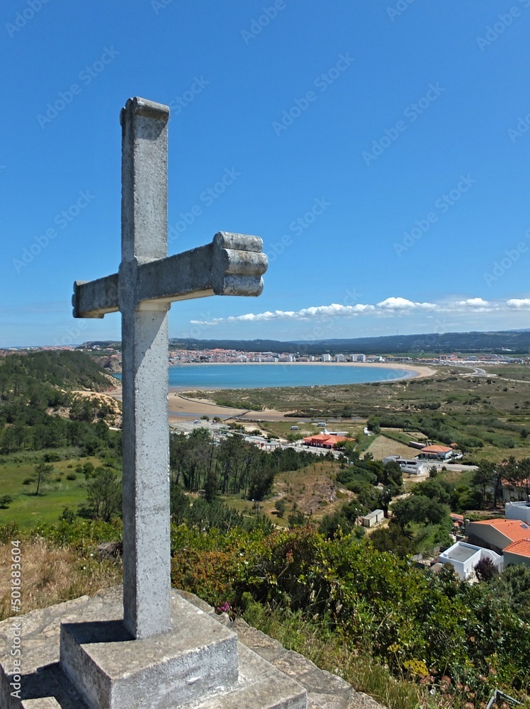 Concha view in Sao Martinho do Porto with stone cross, Centro - Portugal 