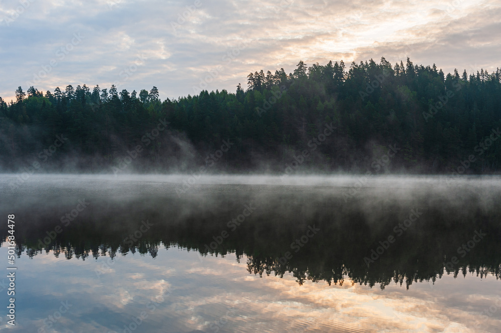 Misty lake at sunrise Misty lake at sunrise