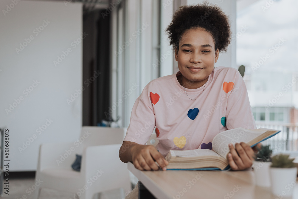 African girl learning online class from school. African american girl learning and doing homework online at home. African girl learning online class from school. African american girl learning and doing homework online at home.