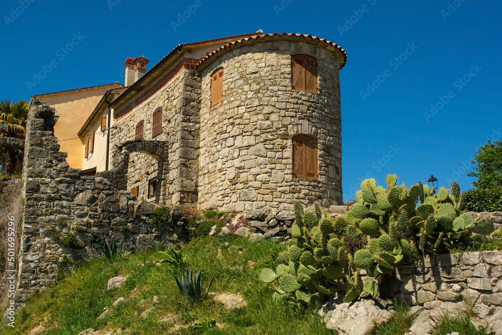 Fototapeta premium Residential buildings in the historic medieval village of Hum in Istria, western Croatia, often referred to as the smallest town in the world 