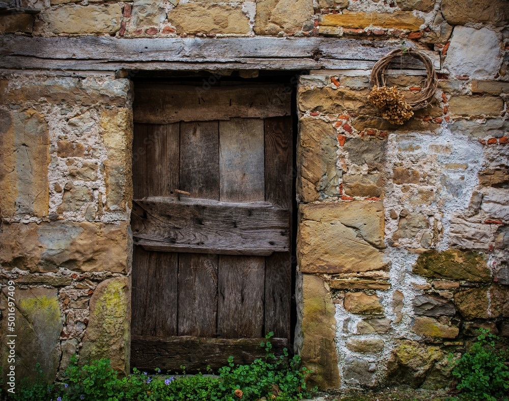 An old wooden door in a derelict house in Poffabro, an historic medieval village in the Val Colvera valley in Pordenone province, Friuli-Venezia Giulia, north east Italy
An old wooden door in a derelict house in Poffabro, an historic medieval village in the Val Colvera valley in Pordenone province, Friuli-Venezia Giulia, north east Italy