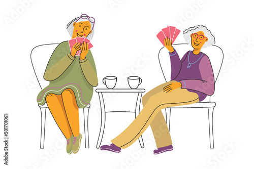Older women playing in card games. Elderly friends spend time together