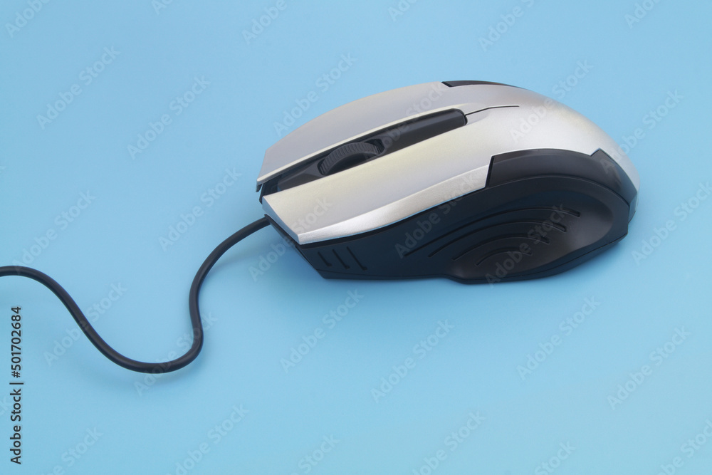 Computer mouse on blue background Computer mouse on blue background