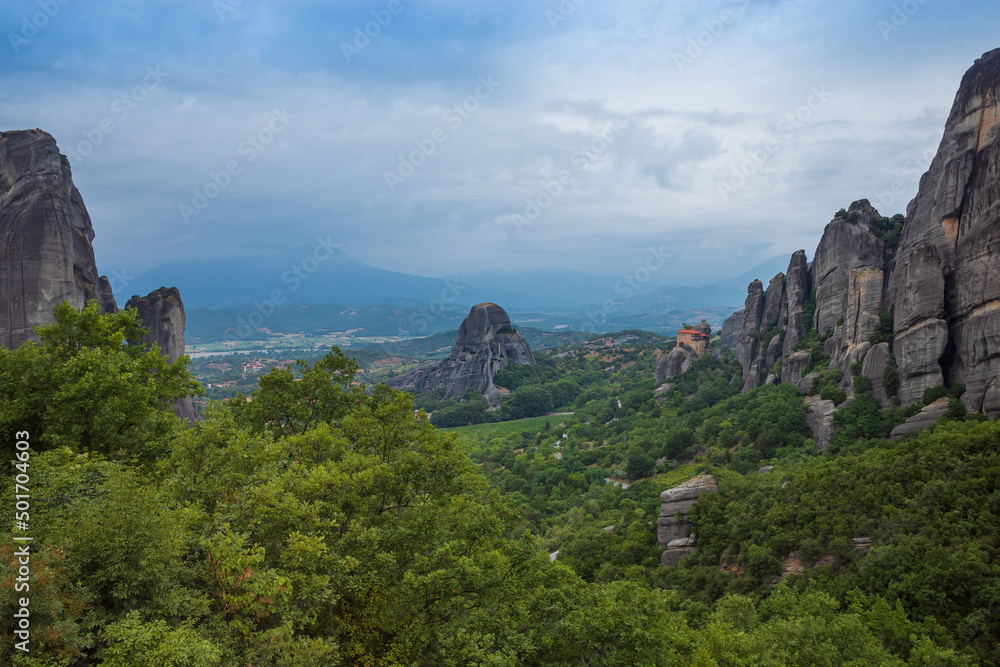 Panoramic view of the Meteora Mountains and Monastery of St. Nicholas of Anapavsas in Greece