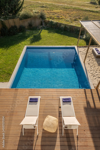 Modern villa with pool and deck with interior