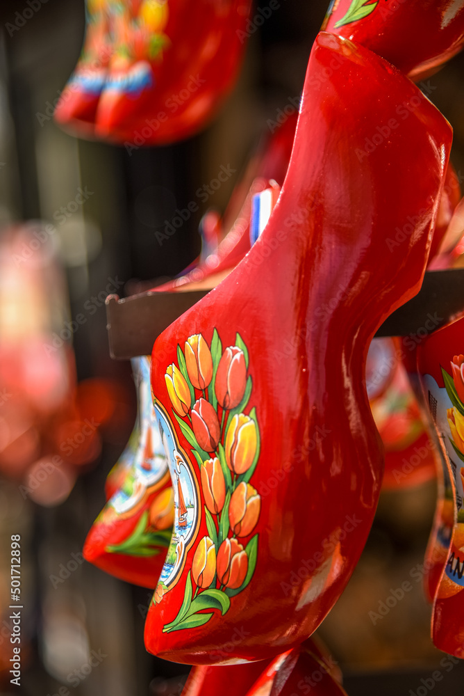 Lisse, Netherlands, April 2022. Clogs and wooden tulips, souvenirs of Holland.