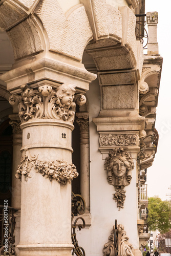 Ancient columns with stucco on the street of Lisbon photo