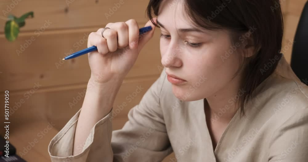 Young frustrated woman sitting on the couch, feeling despair and stress, pain and depression. Person search for a solution. Strong negative emotions. Concept of people having problem and trouble. Young frustrated woman sitting on the couch, feeling despair and stress, pain and depression. Person search for a solution. Strong negative emotions. Concept of people having problem and trouble.