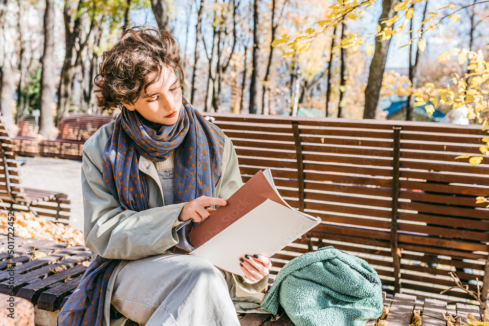 Lonely in autumn park to study or read Lonely in autumn park to study or read