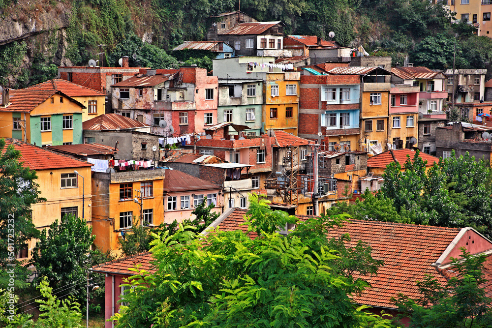 TRABZON CITY, TURKEY.
Colorful neighborhood in the valley next to Comnenos castle, Trabzon city, Black sea region (Pontus), Turkey 