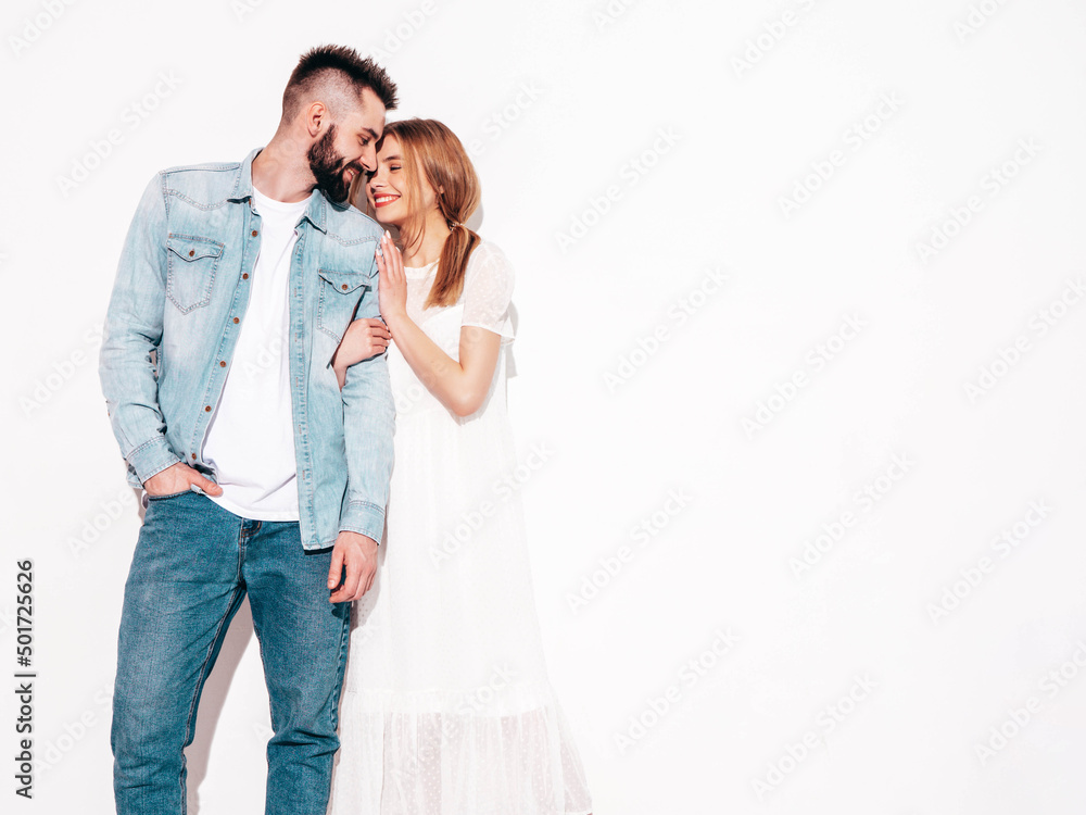 Sexy smiling beautiful woman and her handsome boyfriend. Happy cheerful family having tender moments near blue wall in studio.Pure cheerful models hugging.Embracing each other. Cheerful and happy Sexy smiling beautiful woman and her handsome boyfriend. Happy cheerful family having tender moments near blue wall in studio.Pure cheerful models hugging.Embracing each other. Cheerful and happy