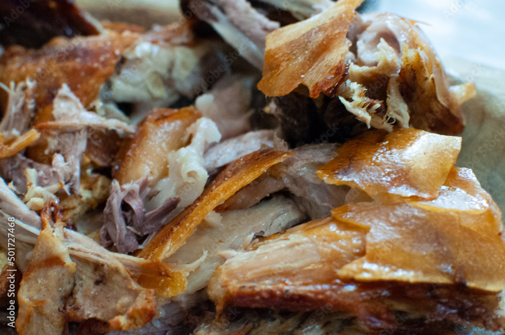 Closeup shot of Porceddu, Sardinian pig meat tipical sardinia food Closeup shot of Porceddu, Sardinian pig meat tipical sardinia food