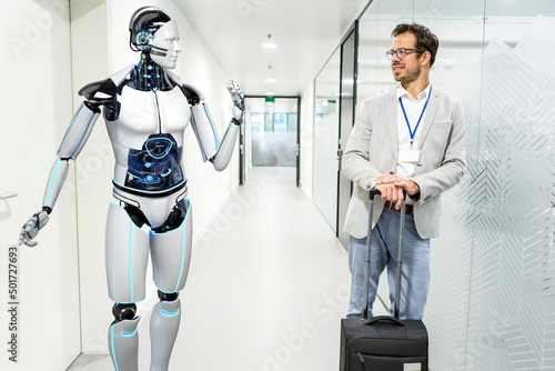 Humanoid robot assists company visitors