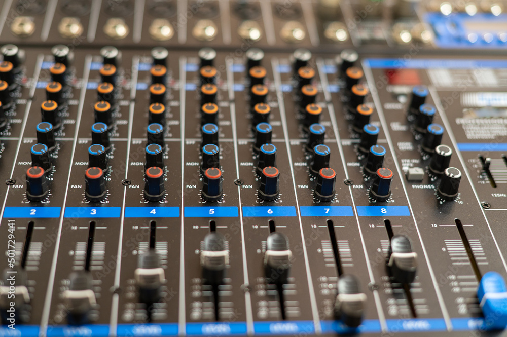 Close up shot with selective focus of mixing desk