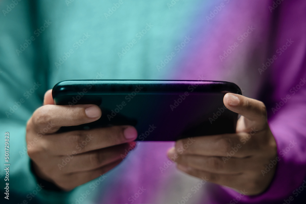 Closeup of Person Using Mobile Phone. Lifestyle of Modern People. Front View. Selective Focus on Smartphone Closeup of Person Using Mobile Phone. Lifestyle of Modern People. Front View. Selective Focus on Smartphone