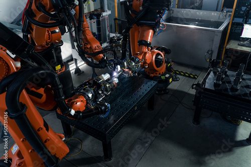 Robotic arm at industrial manufacture factory. Automated production cell.